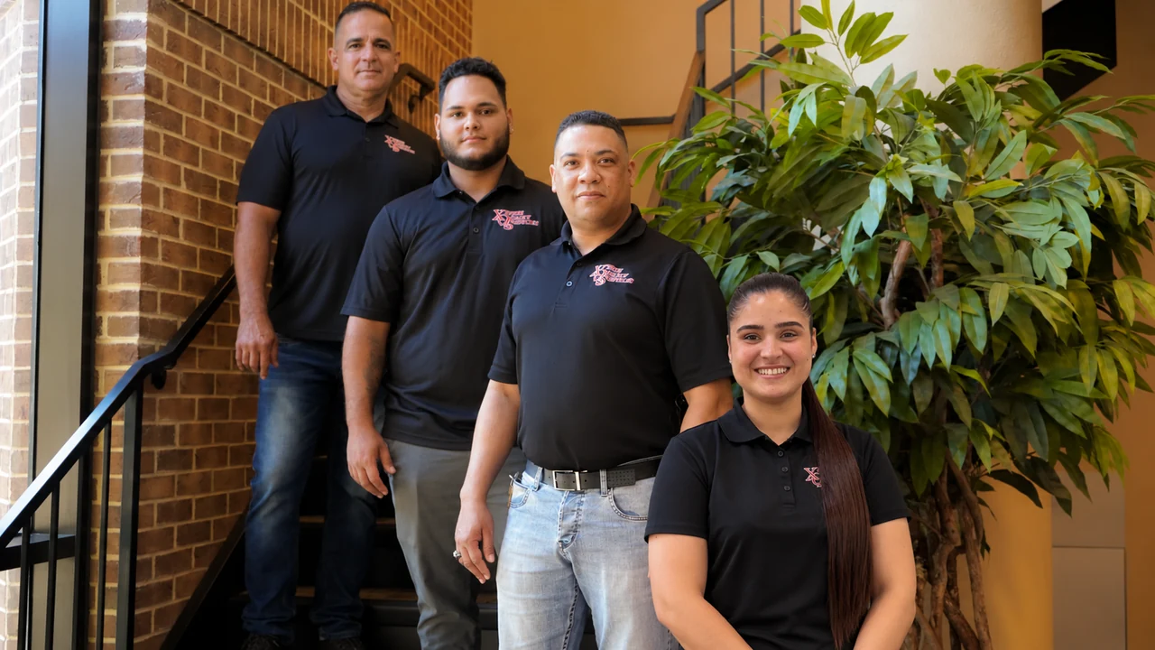 The XQS team standing together