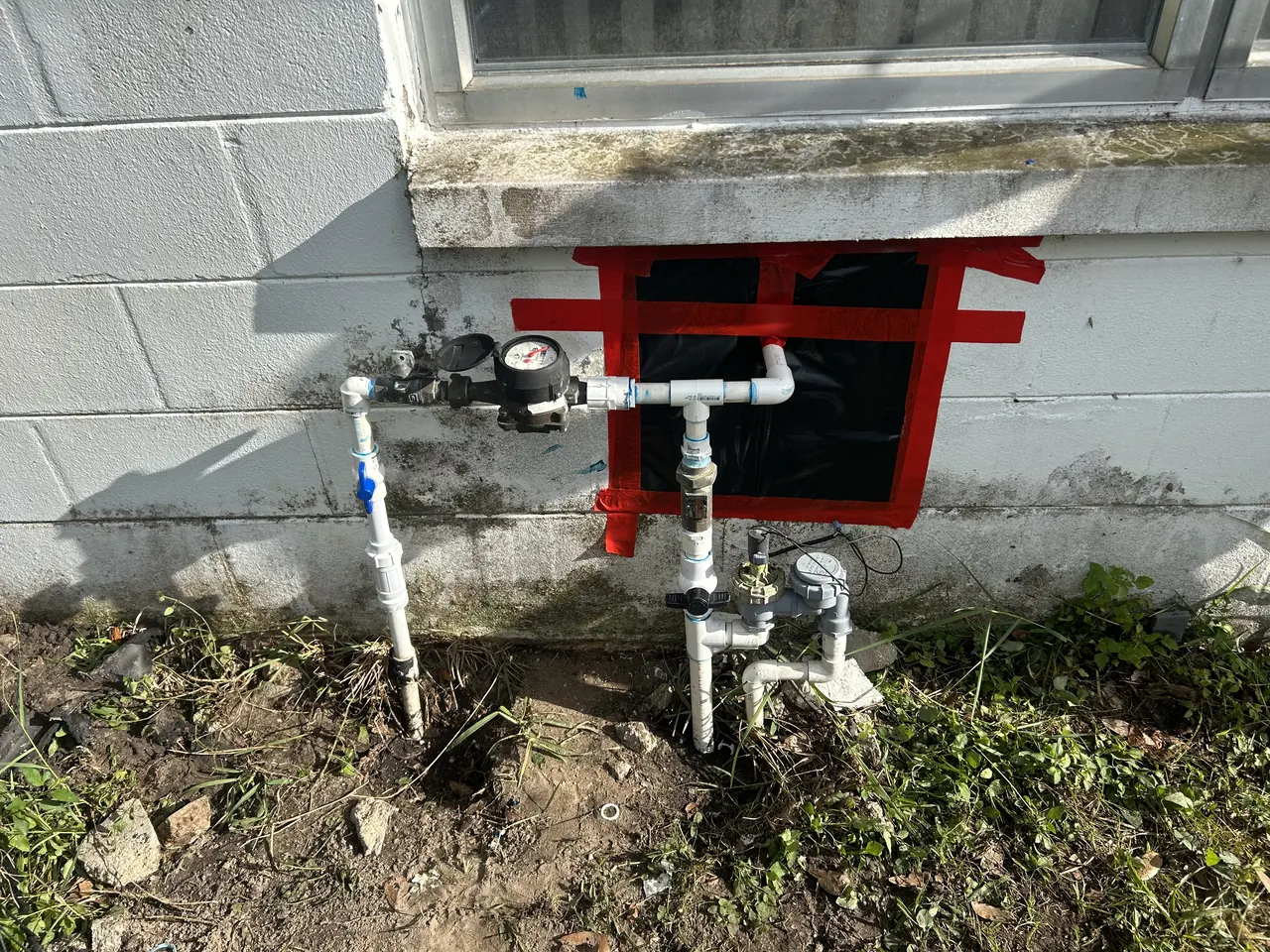Exterior piping documented during a leak repair in Holiday.