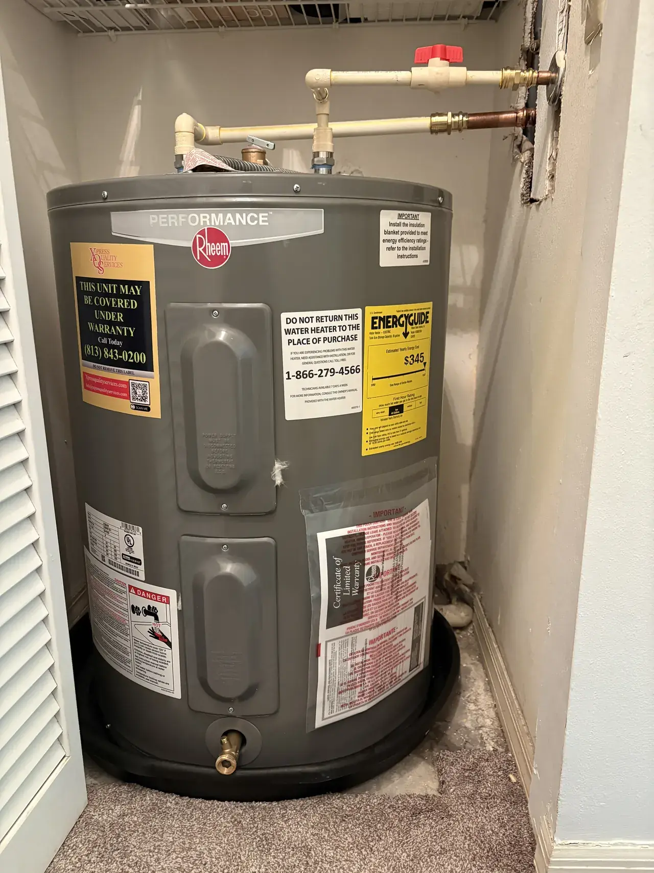 Tank water heater documented during a replacement service in Palm Harbor.